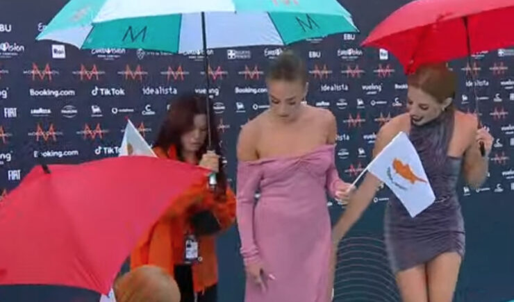 Andromache caught in the rain at Eurovision 2022