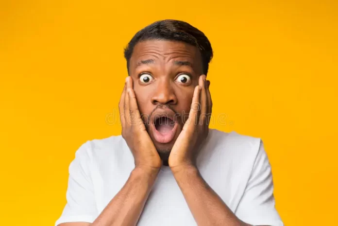 surprised-black-man-touching-face-posing-over-orange-background-omg-surprised-black-man-touching-face-looking-camera-shock-169071007