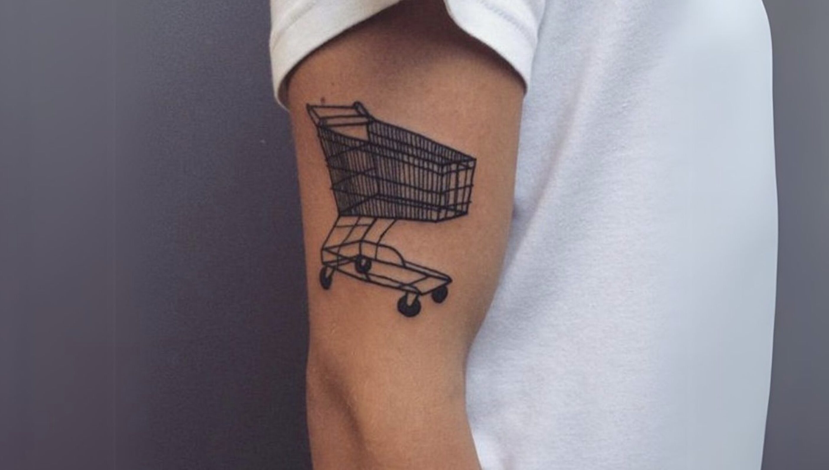 Nick “does” 2025 – Denmark A slightly half-hearted tattoo of a supermarket trolley