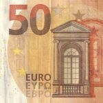50 euro note with a scribbled note to 'remember to vote for us'